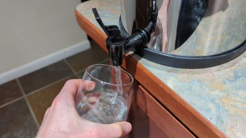 Filling a glass of water from a Berkey filter