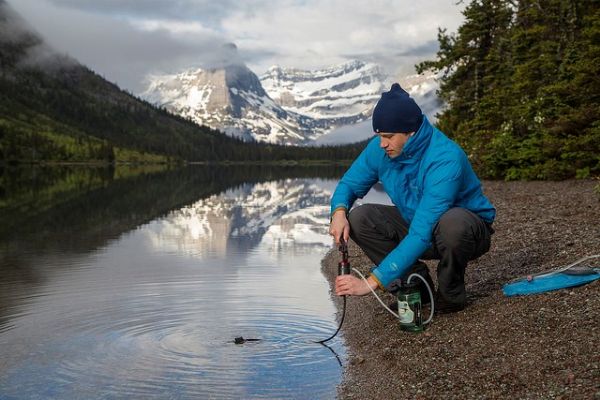 filtering water from lake with pump filter