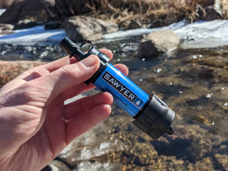 Portable water filter for removing turbidity in the backcountry