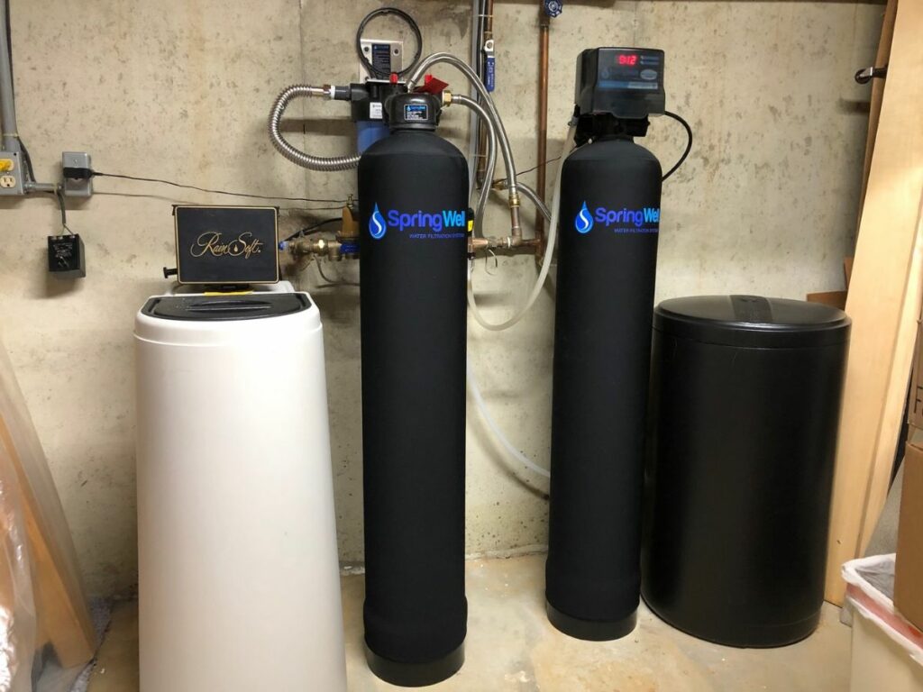 Water filtration system and salt based ion exchange water softener