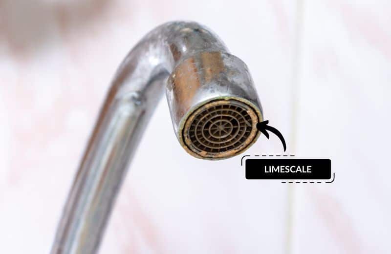 Limescale on faucet caused by hard water