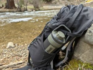 portable water bottle filter grayl ultrapress in backpack