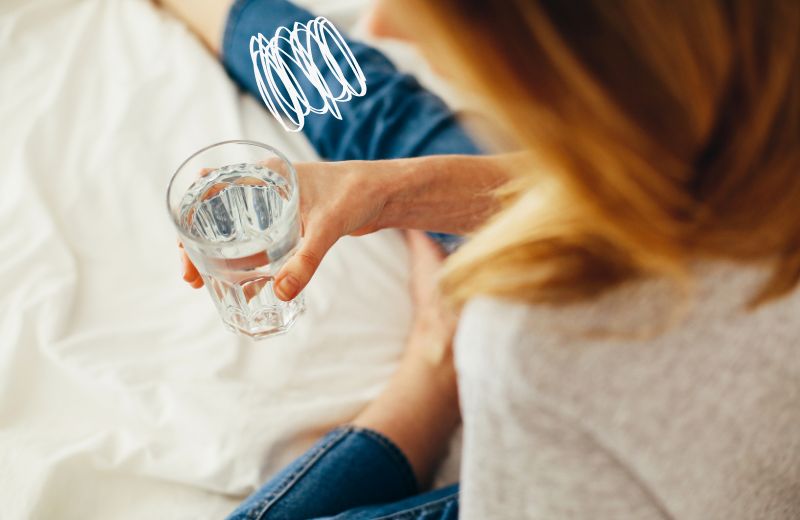 Woman not feeling well after drinking water with silver