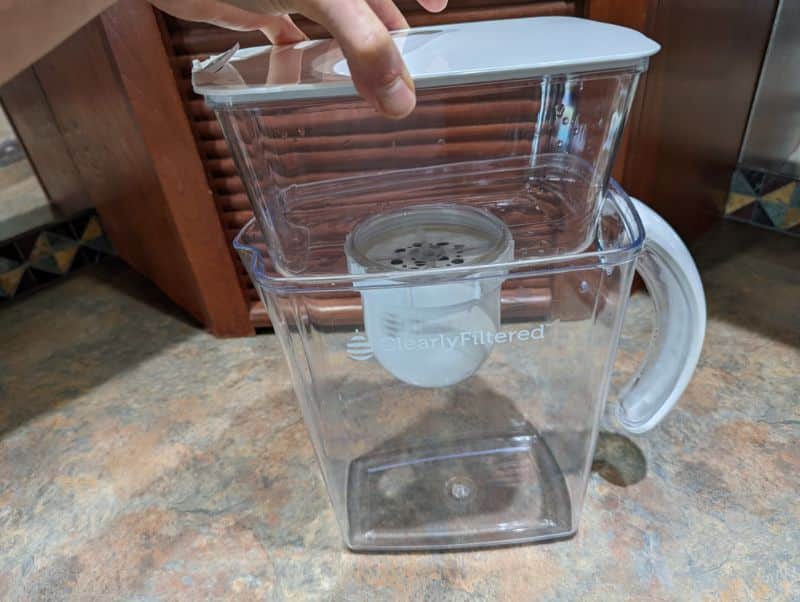 Installing the top reservoir of the Clearly Filtered pitcher