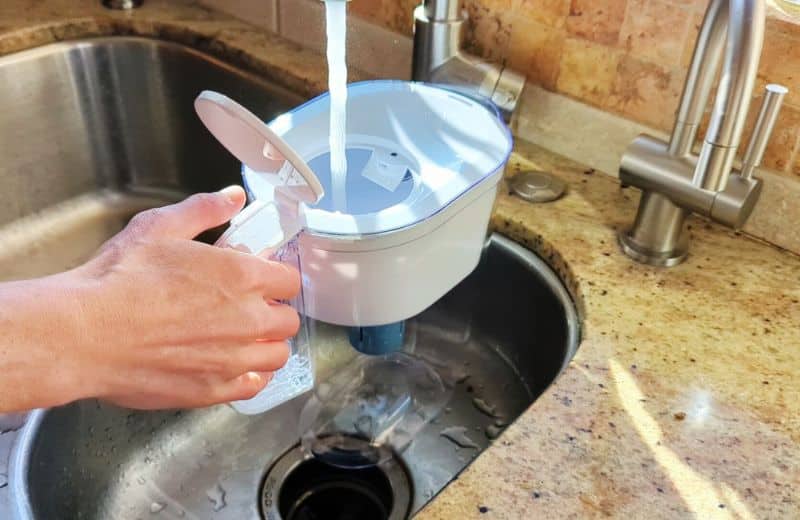 Filling the brita pitcher with water