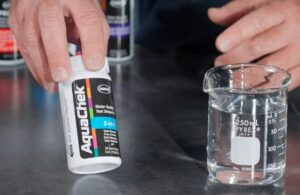 Hach total hardness next to a testing tube filled water