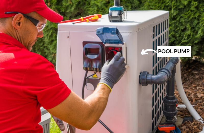 Technician checking pool pump