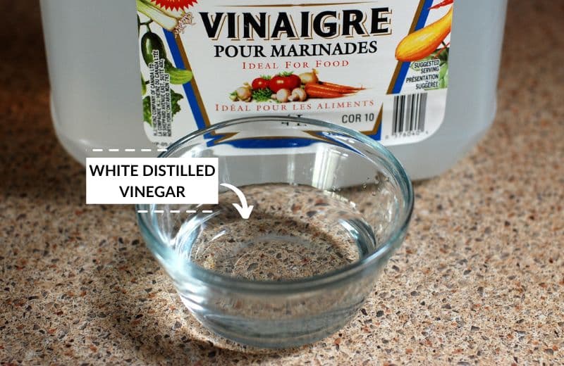 White distilled vinegar for hard water stain removal