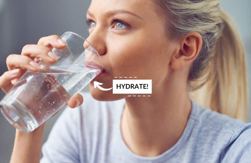 Woman drinking salt-softened water