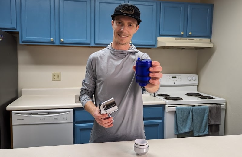 Brian holding the PUR faucet mount filter cartridge