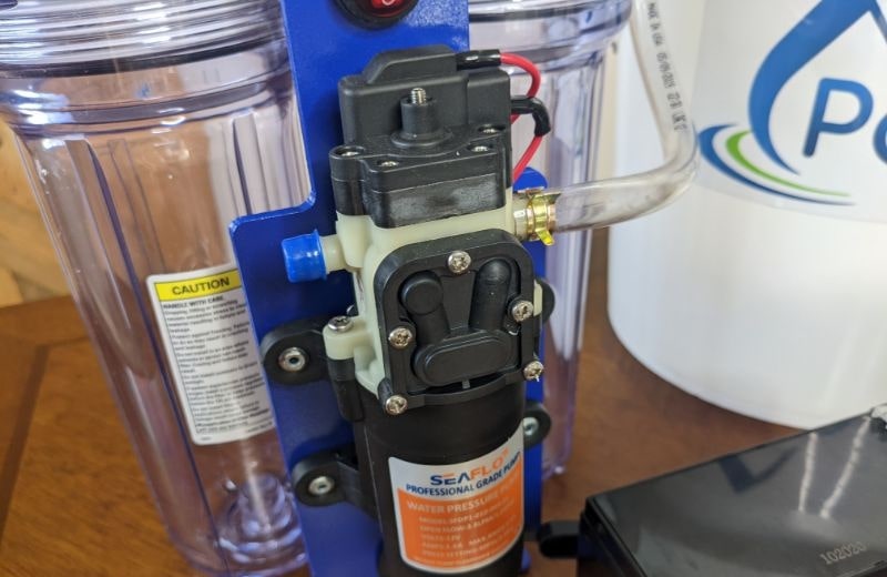 Integrated pump on portawell water filter system