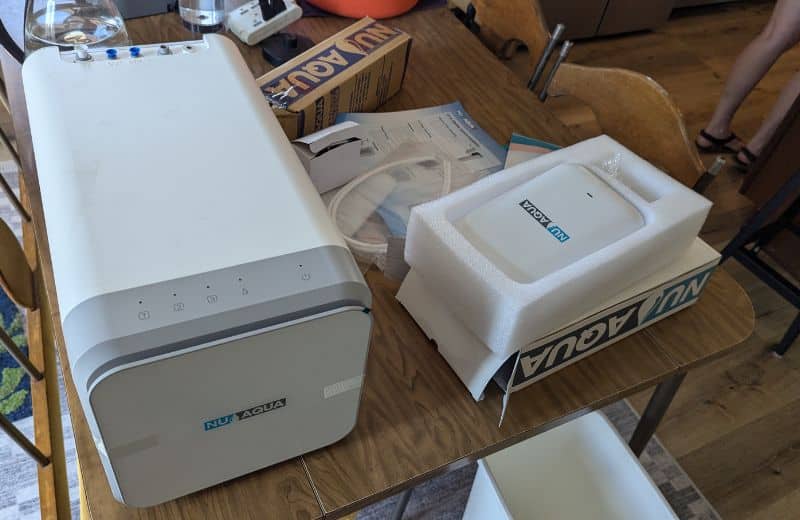NU Aqua unboxed at a table