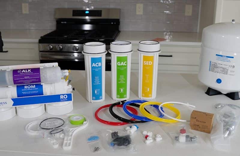 Express RO5DX Parts Photo of complete parts included in the Express Water RO5DX reverse osmosis system kit